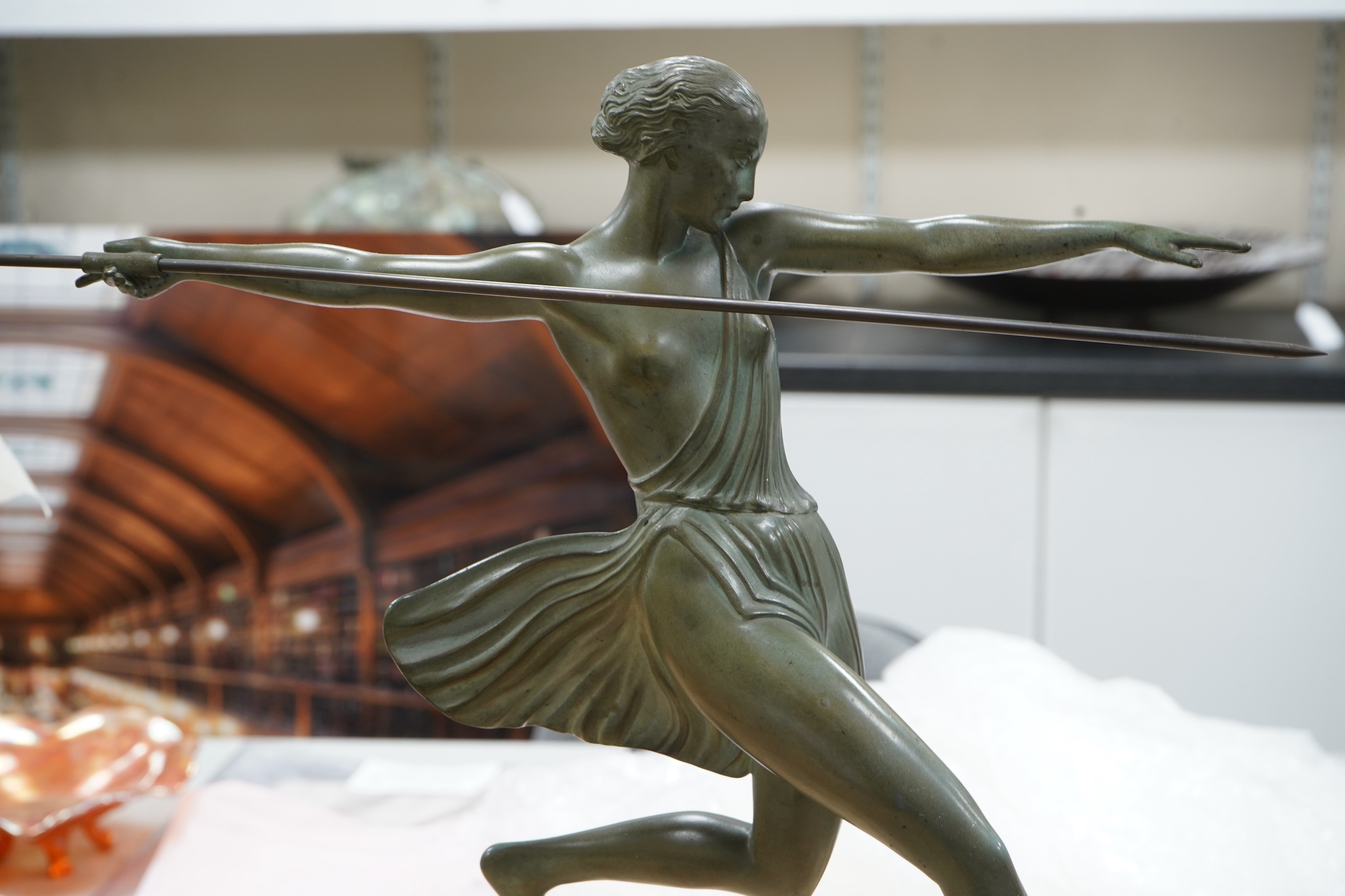 Pierre Le Faguays, (Fayral) - Bronzed metal on stone, ‘the huntress’. 42cm wide x 39cm high